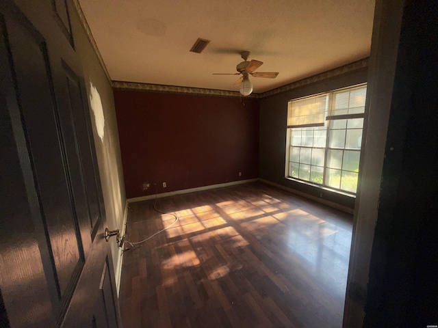 106 Galahad Ct, Hot Springs, AR 71913 - empty room with ceiling fan, wood finished floors, and baseboards