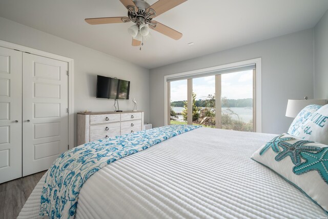 bedroom featuring ceiling fan and wood finished floors