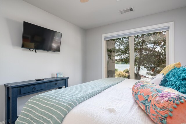 bedroom with access to outside and visible vents