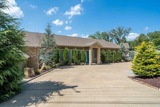 view of front of home with concrete driveway