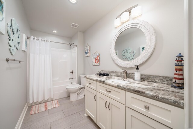 full bath featuring shower / bath combo, visible vents, toilet, vanity, and recessed lighting