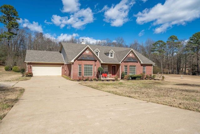 view of front facade featuring an attached garage, brick siding, driveway, roof with shingles, and a front lawn