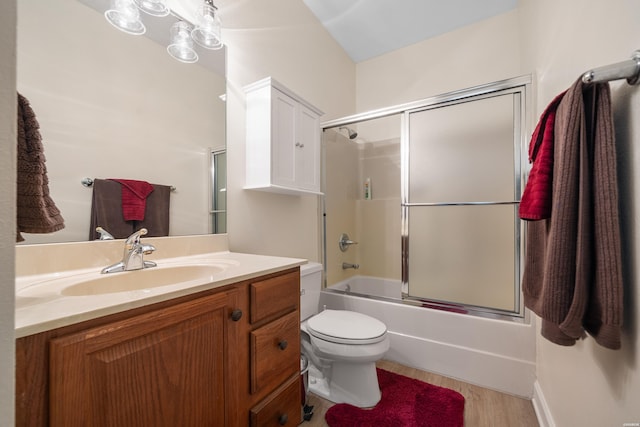 126 Bay Ridge Loop, Hot Springs, AR 71901 - bathroom with toilet, wood finished floors, vanity, and enclosed tub / shower combo