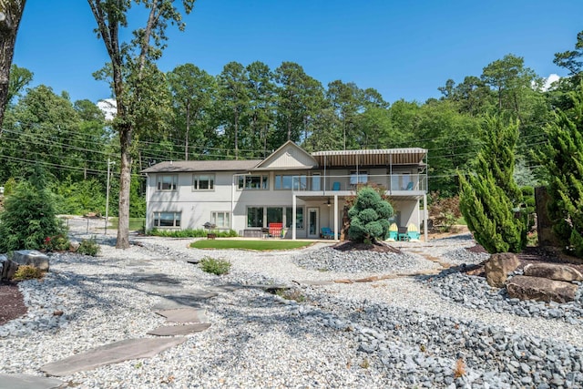 view of front of property with a balcony