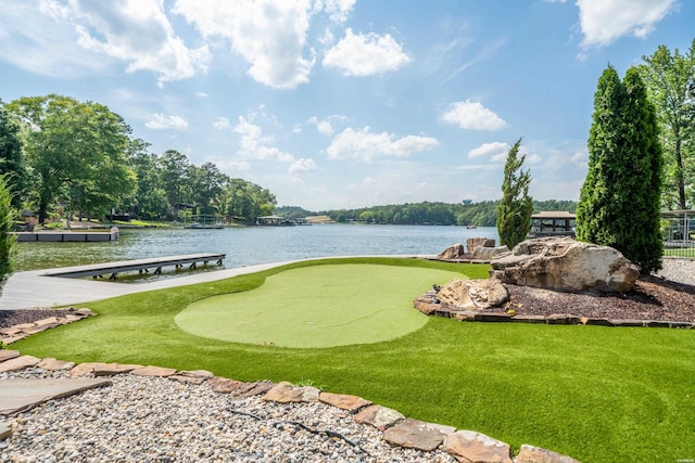 view of community featuring view of golf course and a water view