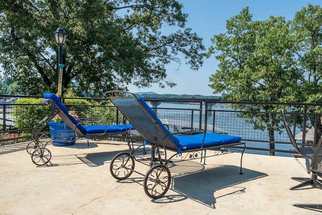 view of patio / terrace with a water view