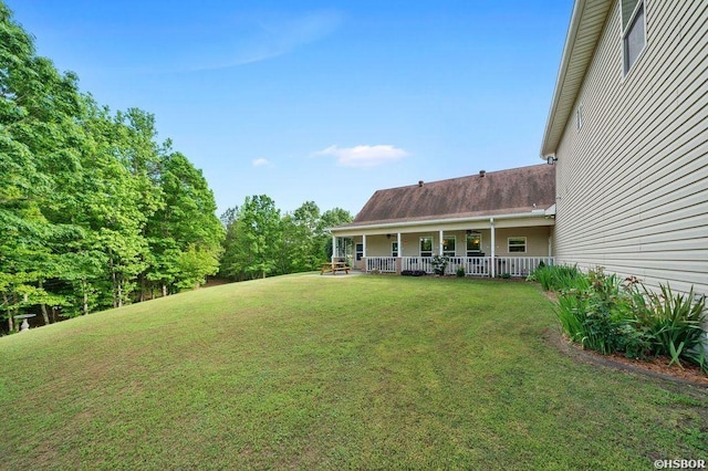 view of yard featuring a porch