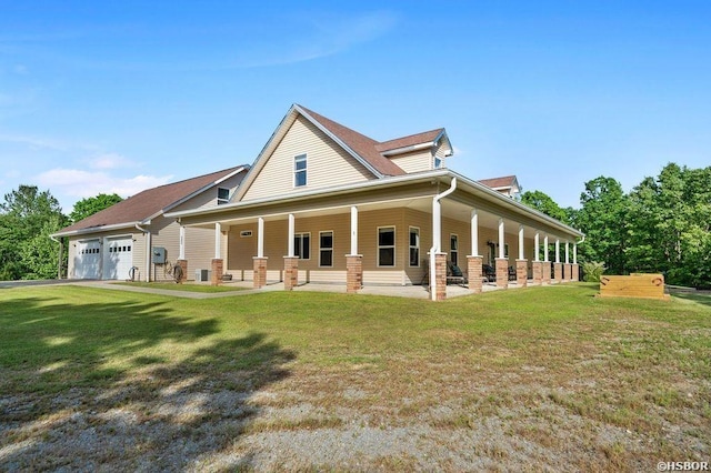 exterior space with covered porch and an attached garage