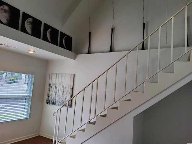 111 Prospect Ave Unit 10, Hot Springs, AR 71901 - staircase featuring wood finished floors, visible vents, and baseboards