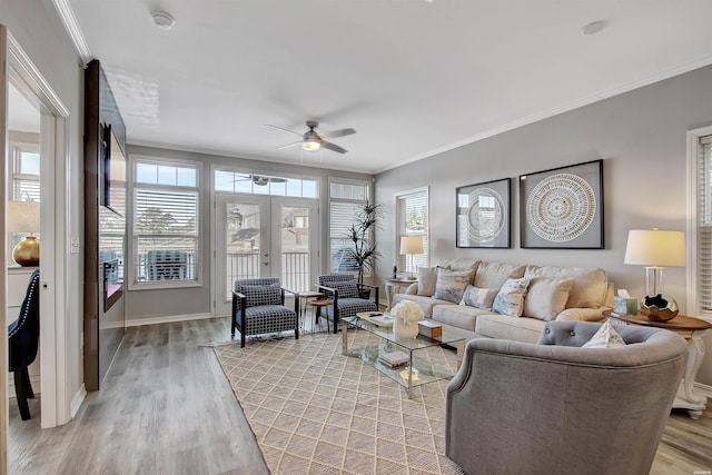 532 Grand Point Dr Unit C1, Hot Springs, AR 71901 - living room with light wood-style flooring, baseboards, ornamental molding, and ceiling fan
