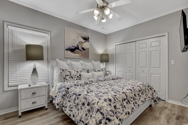 532 Grand Point Dr Unit C1, Hot Springs, AR 71901 - bedroom featuring a closet, baseboards, a ceiling fan, and wood finished floors