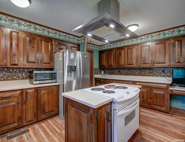 7 Sonora Way, Hot Springs Village, AR 71909 - kitchen featuring stainless steel appliances, island range hood, a textured ceiling, decorative backsplash, and light wood-style flooring