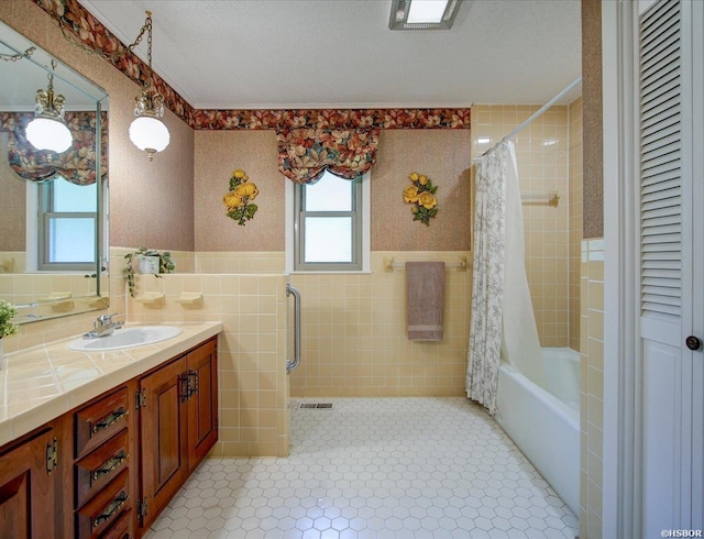 7 Sonora Way, Hot Springs Village, AR 71909 - bathroom with tile walls, vanity, shower / bath combination with curtain, and wainscoting