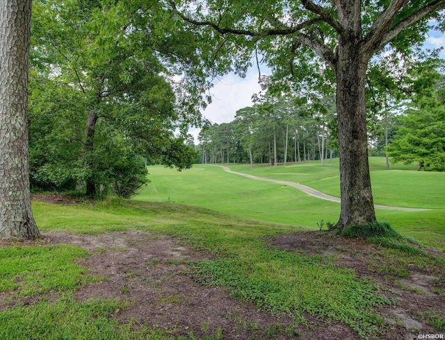 7 Sonora Way, Hot Springs Village, AR 71909 - view of property's community with a lawn, view of golf course, and view of wooded area