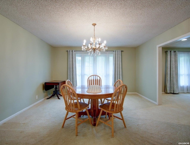 7 Sonora Way, Hot Springs Village, AR 71909 - carpeted dining space with a chandelier, plenty of natural light, and a textured ceiling