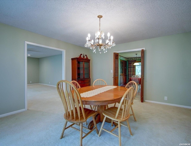 7 Sonora Way, Hot Springs Village, AR 71909 - dining space featuring a chandelier, light carpet, and a textured ceiling