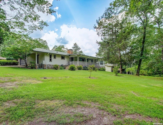 7 Sonora Way, Hot Springs Village, AR 71909 - view of grassy yard featuring covered porch
