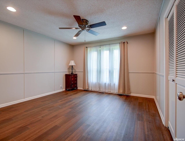 7 Sonora Way, Hot Springs Village, AR 71909 - empty room with dark wood-type flooring, ceiling fan, a textured ceiling, and recessed lighting