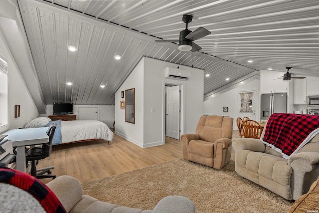 bedroom featuring light wood finished floors, lofted ceiling, stainless steel fridge with ice dispenser, and a wall unit AC