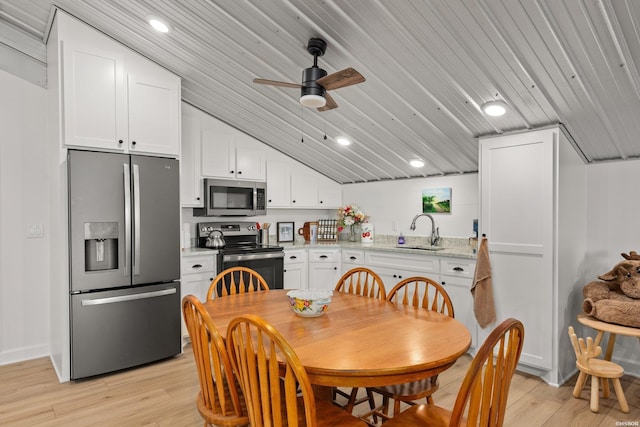 dining room with a ceiling fan, recessed lighting, light wood finished floors, lofted ceiling, and wood ceiling