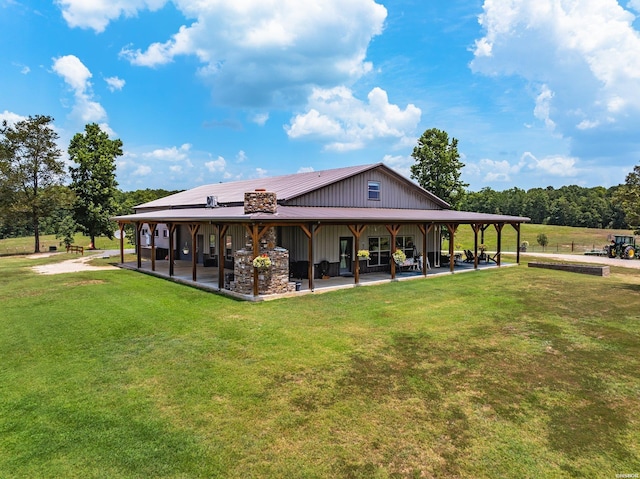 view of community featuring a patio and a lawn