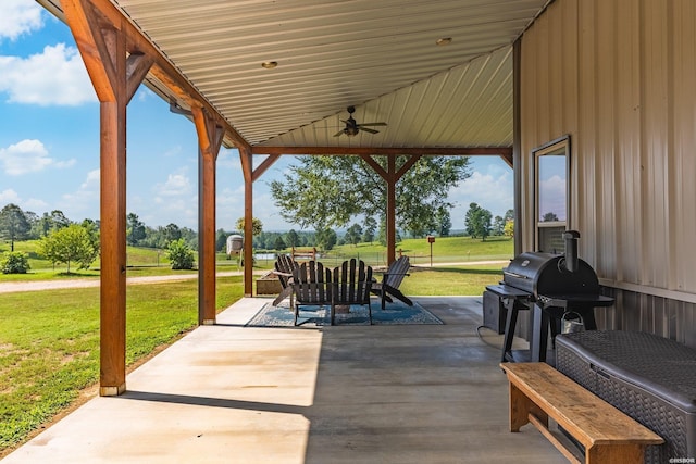 view of patio / terrace featuring a grill and a ceiling fan