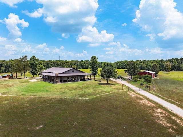 birds eye view of property featuring a rural view