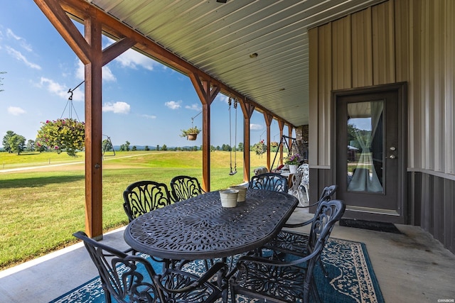 view of patio with outdoor dining area