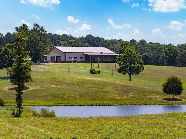 exterior space featuring a rural view and fence