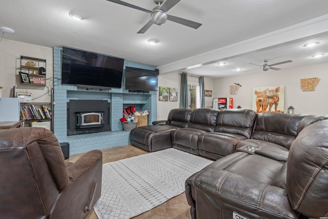 tiled living area featuring a ceiling fan and recessed lighting