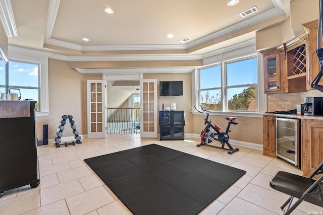 116 Lake Forest Shores Dr, Hot Springs, AR 71913 - exercise area with a tray ceiling, beverage cooler, visible vents, and light tile patterned floors