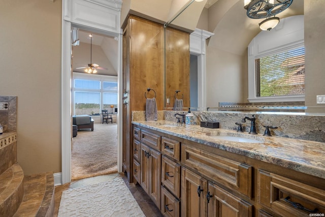 116 Lake Forest Shores Dr, Hot Springs, AR 71913 - bathroom featuring double vanity, vaulted ceiling, ceiling fan, and a sink