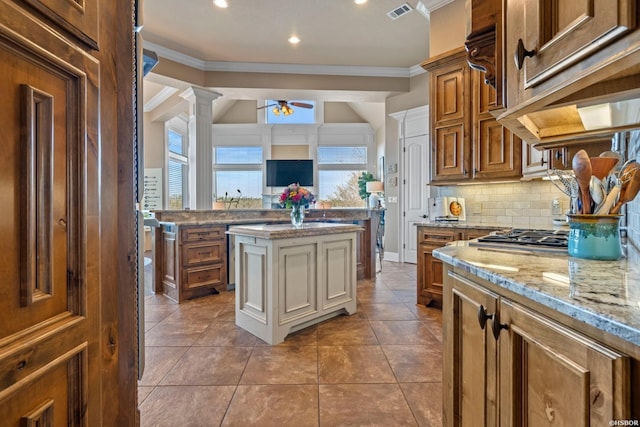 116 Lake Forest Shores Dr, Hot Springs, AR 71913 - kitchen with a ceiling fan, ornamental molding, decorative backsplash, and visible vents