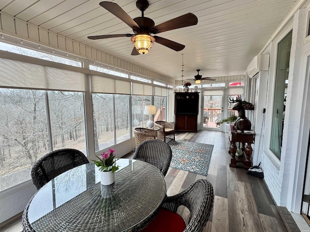 sunroom with a wall unit AC