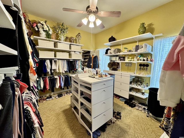 spacious closet with ceiling fan