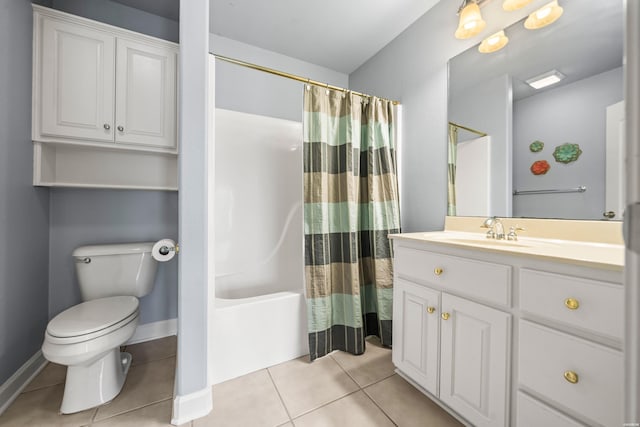 bathroom with shower / bath combination with curtain, toilet, vanity, baseboards, and tile patterned floors