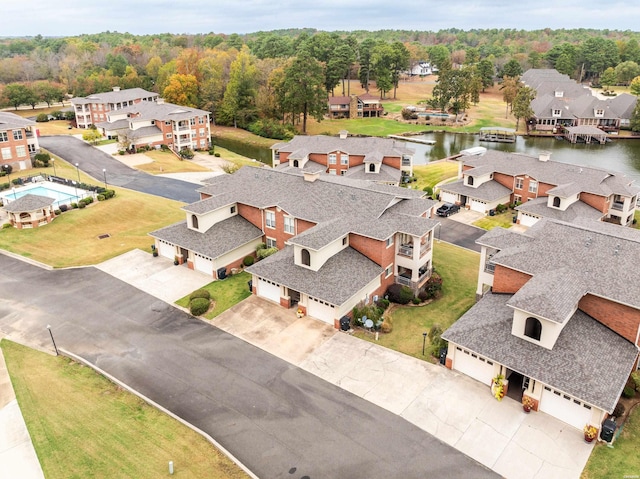 aerial view with a residential view and a water view