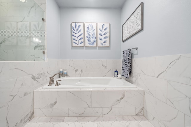 full bathroom with a garden tub