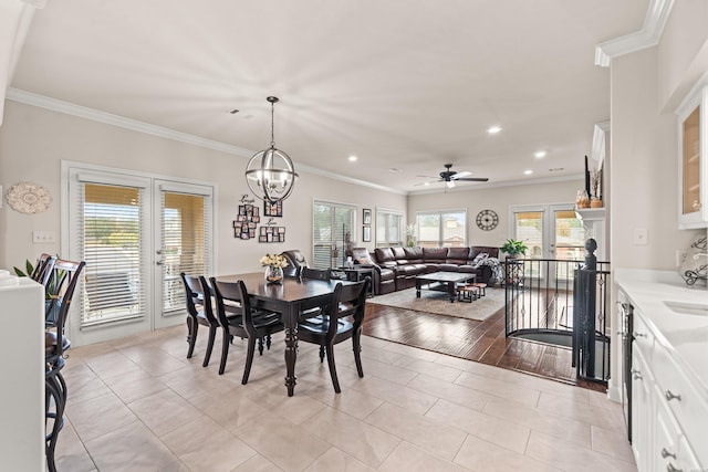 dining room featuring light tile patterned flooring, ornamental molding, french doors, and recessed lighting