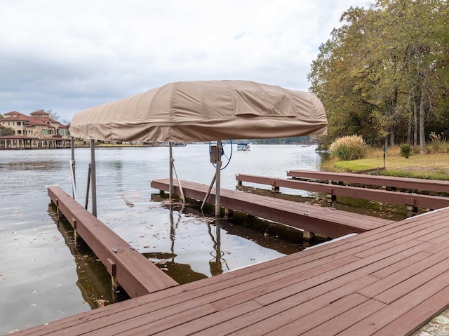 view of dock with a water view