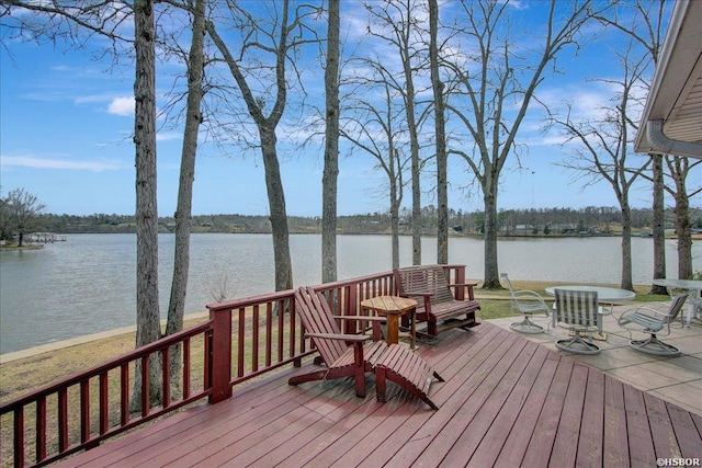 deck featuring a water view