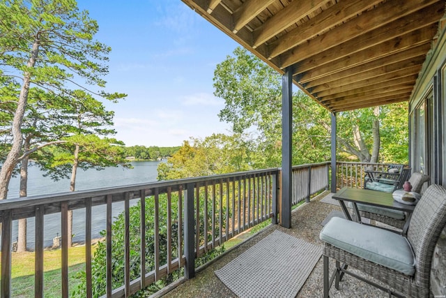 balcony featuring a water view