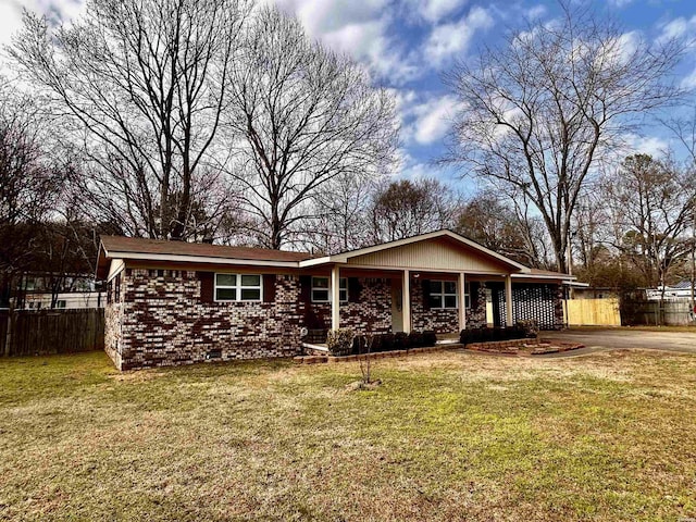 ranch-style house with crawl space, fence, a front yard, a porch, and brick siding