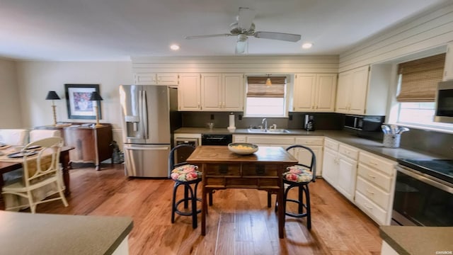 338 Sunset Bay Rd, Hot Springs, AR 71913 - kitchen featuring black appliances, plenty of natural light, ceiling fan, light wood-style floors, and recessed lighting