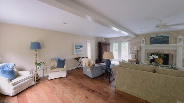 338 Sunset Bay Rd, Hot Springs, AR 71913 - living room featuring light wood finished floors, a fireplace, and ceiling fan