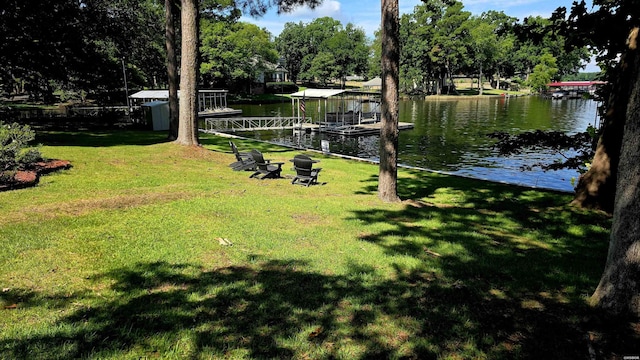 338 Sunset Bay Rd, Hot Springs, AR 71913 - view of grassy yard featuring a water view, a boat dock, and view of scattered trees