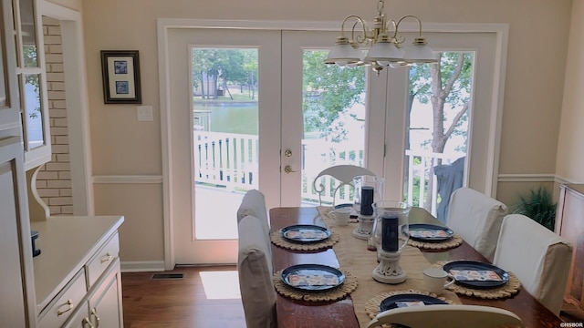 338 Sunset Bay Rd, Hot Springs, AR 71913 - dining room featuring a chandelier, wood finished floors, and french doors