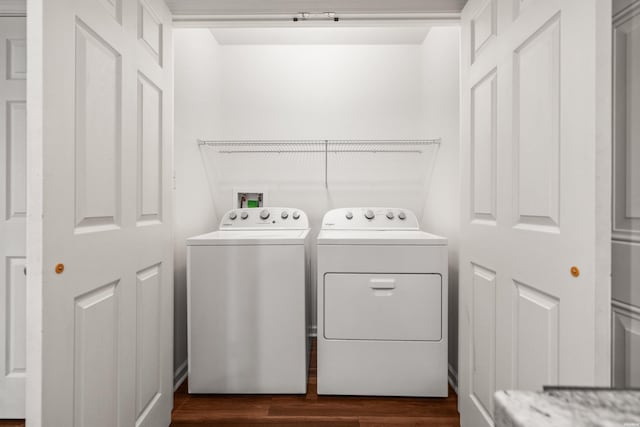 231 Garland Ave, Hot Springs, AR 71913 - washroom with washing machine and dryer and dark wood finished floors