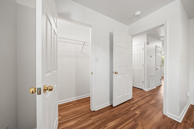 231 Garland Ave, Hot Springs, AR 71913 - unfurnished bedroom featuring dark wood-style flooring and baseboards