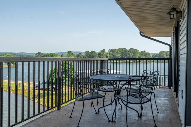 5371 Central Ave Unit 6J, Hot Springs, AR 71913 - balcony with a water view and outdoor dining space